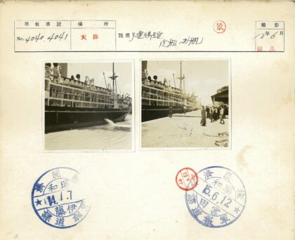 停泊大船与救生艇人群.jpg