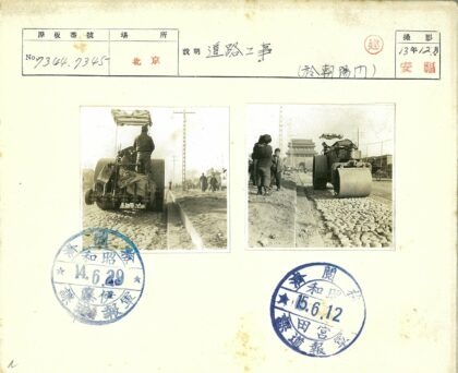 压路机旁的传统建筑街景.jpg