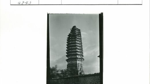多云天空下的风化古塔.jpg