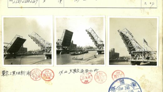 河上吊桥与城市建筑.jpg