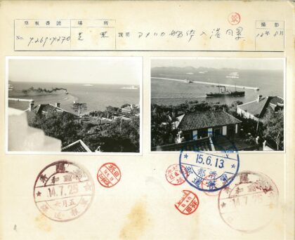 海岸防波堤船只与瓦屋远山.jpg