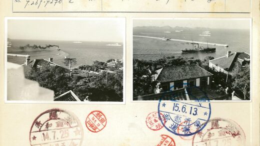 海岸防波堤船只与瓦屋远山.jpg