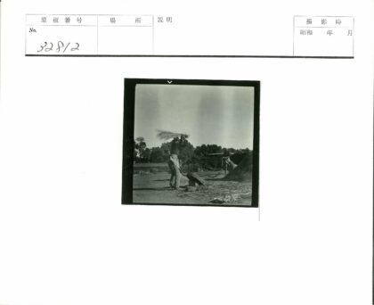传统打谷劳作场景.jpg