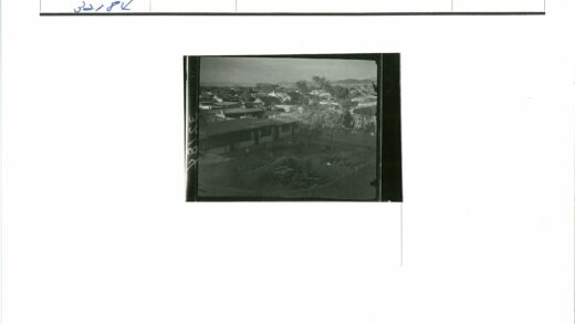 住宅区后院木头堆与远山景色.jpg