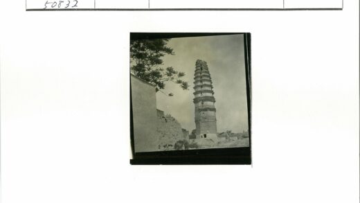古老砖塔与石墙树林景观.jpg