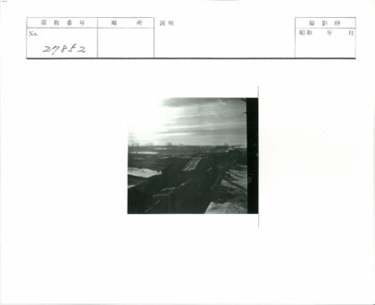 多云天空下的建筑与远树.jpg