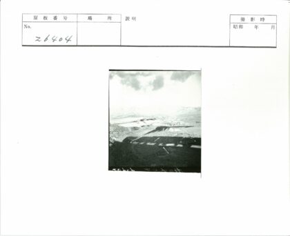 多云天空下的连绵丘陵与远山.jpg
