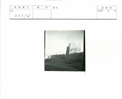 多云天空下石筑建筑远山.jpg