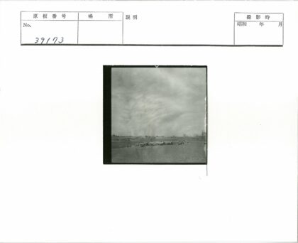 多云田野羊群远树建筑.jpg