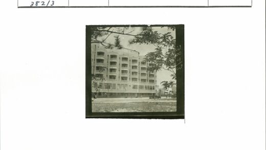 多层建筑与绿树道路景观.jpg
