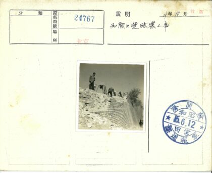 工人修缮砖墙施工实景.jpg