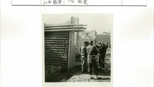 建筑工人与未完工的楼房.jpg