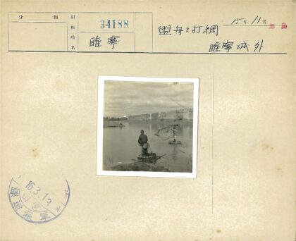 河上撒网与古城墙.jpg