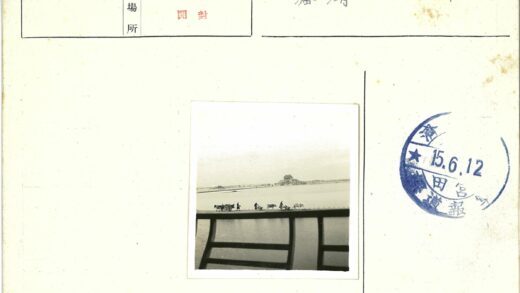 河边牛车与传统建筑.jpg
