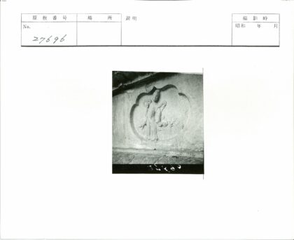 石墙人物雕刻细节特写.jpg