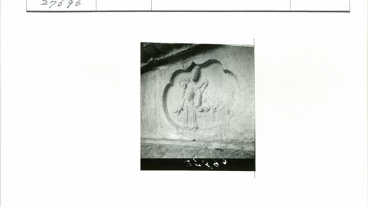石墙人物雕刻细节特写.jpg