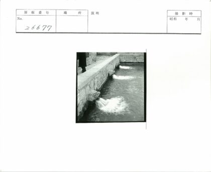 石墙人脸喷水口景观.jpg