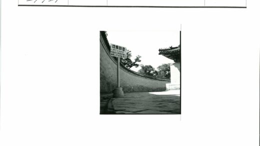 石墙砖路与古建筑风景.jpg