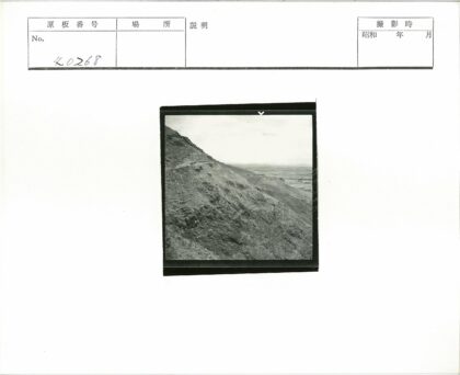 陡峭山坡小路远眺平原.jpg
