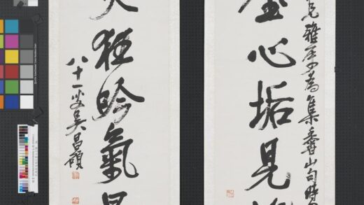 民国吴昌硕行书七言联轴.jpg