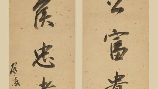 顾莼 行书七言联.jpg