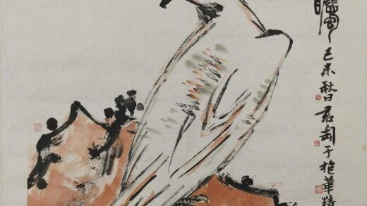 钱君匋 鹰石远瞩图轴.jpg